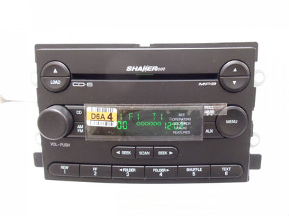 New 2005 - 2006 Ford Shaker 1000 Radio 6 Disc MP3 CD Changer Player